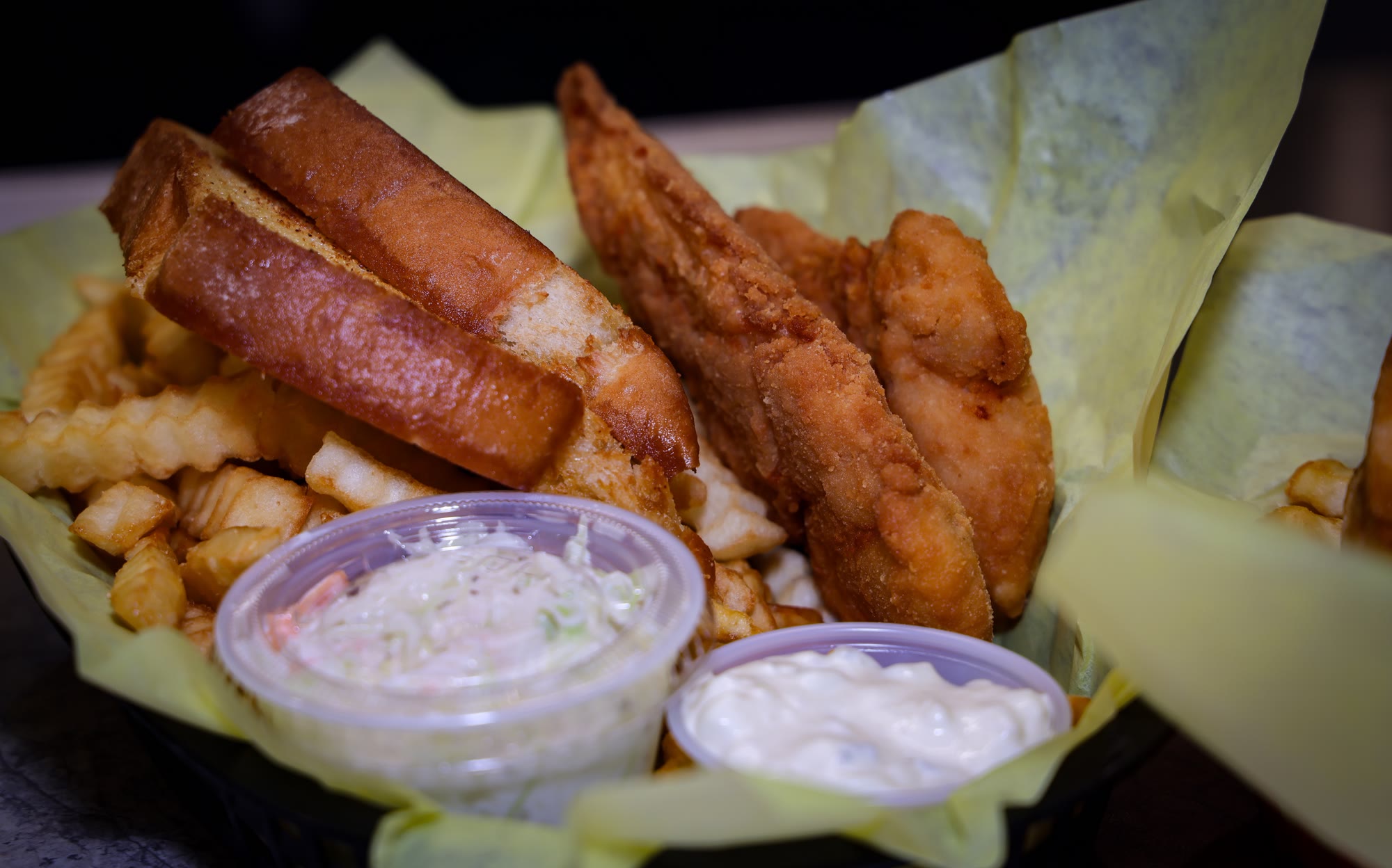 Strips basket with toast, fries and coleslaw