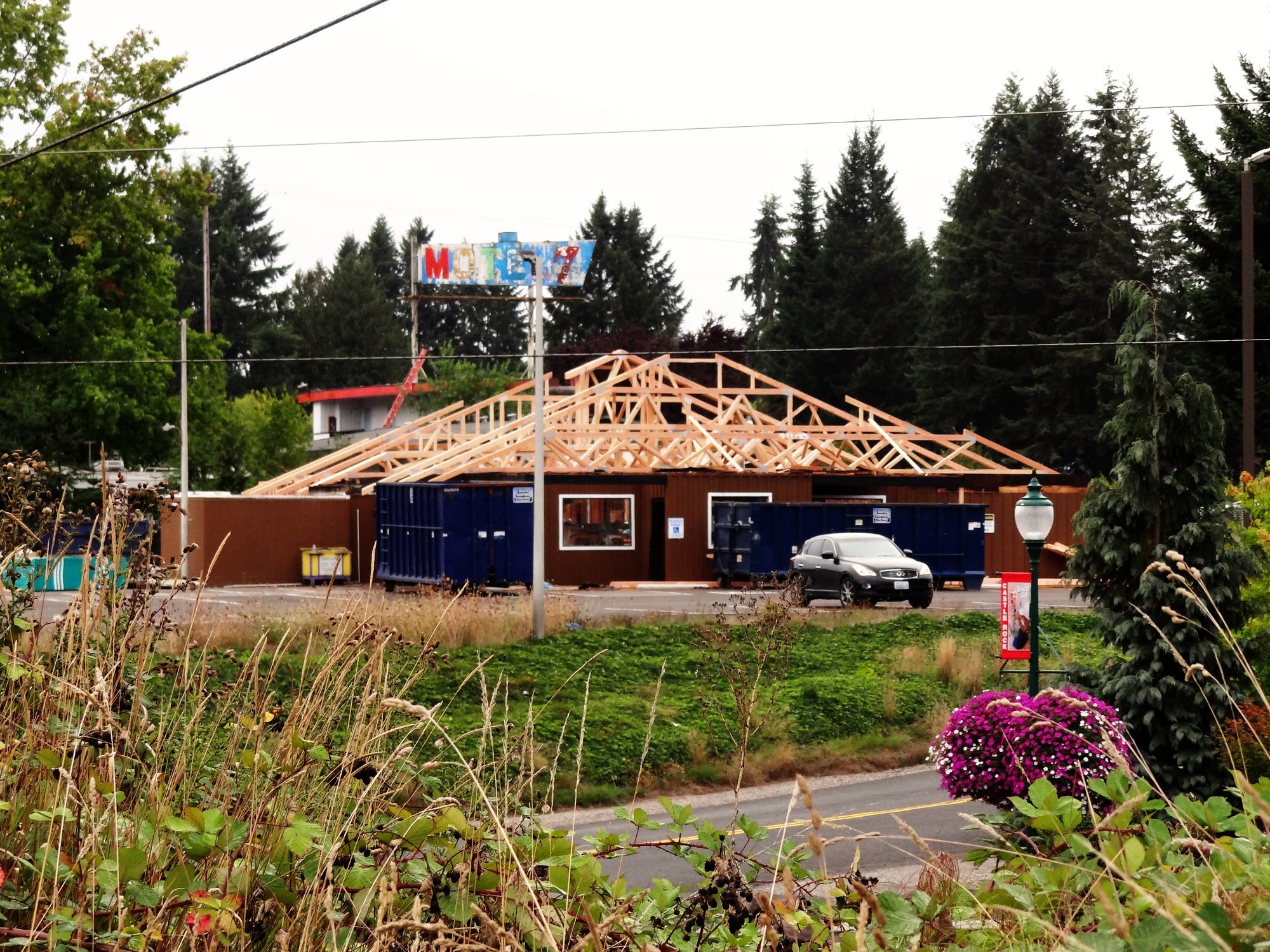 The building from the street with the new trusses up