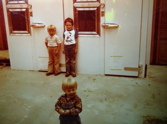 Kids by the doors of the new walk in