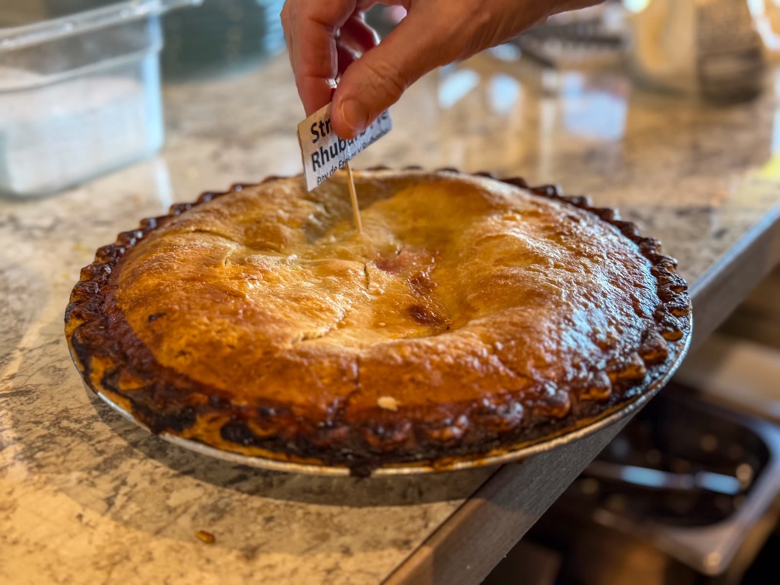 Slice of strawberry rhubarb pie