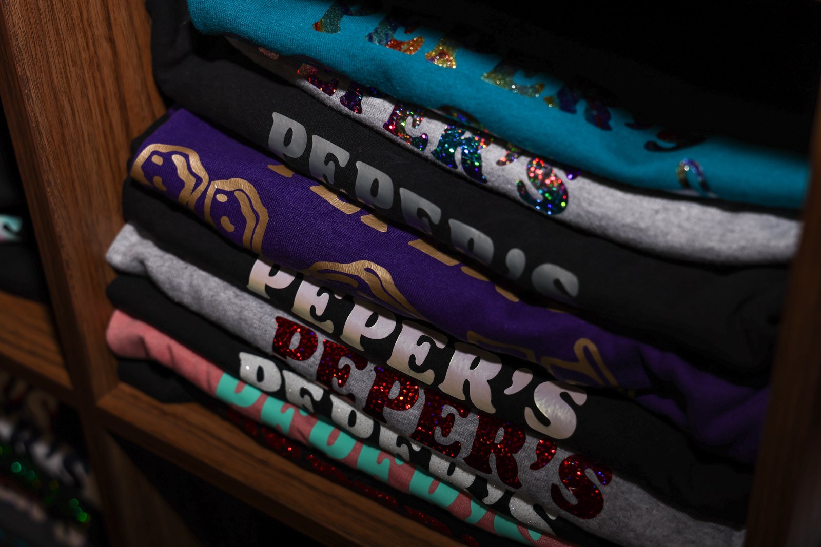 Stack of Peper's T shirts