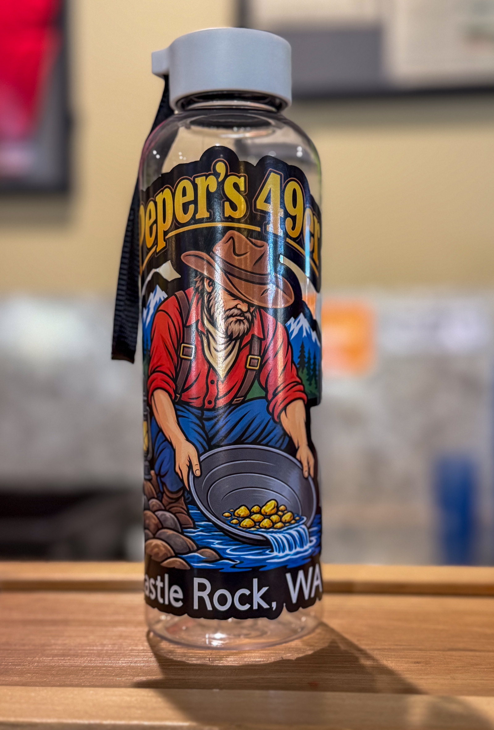 Peper's 49er water bottle with a gold miner panning for gold, Castle Rock, WA